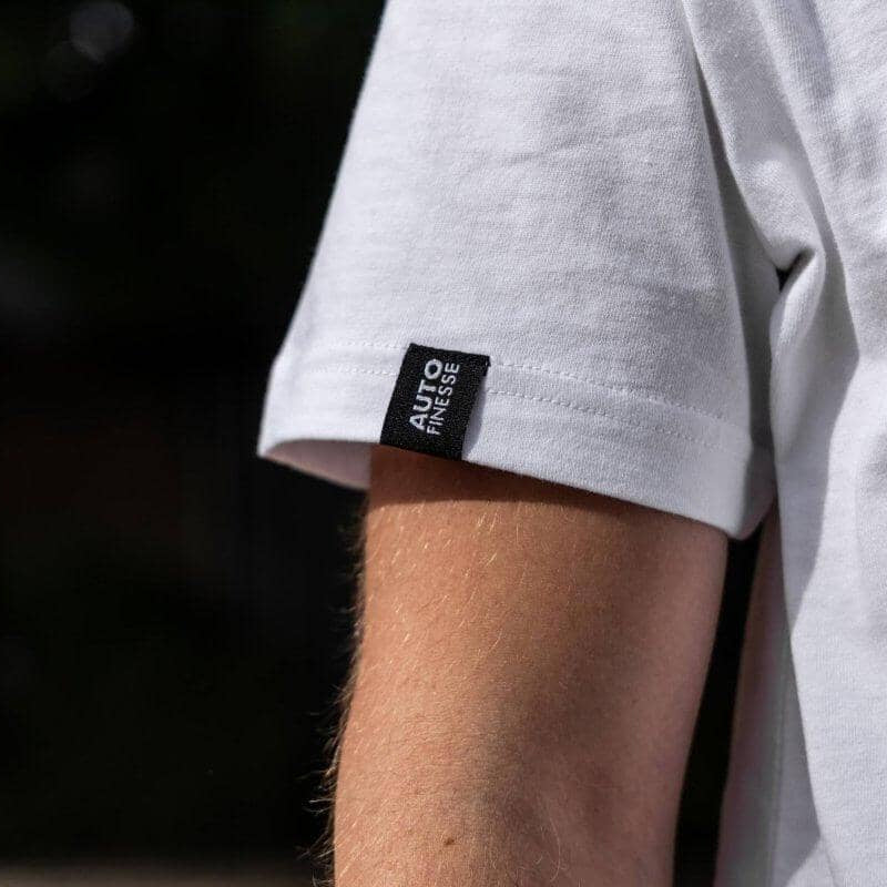 Man Wearing Premium Geographic T-shirt_ Logo Closeup