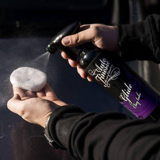 Spraying Glide on Clay Bar 