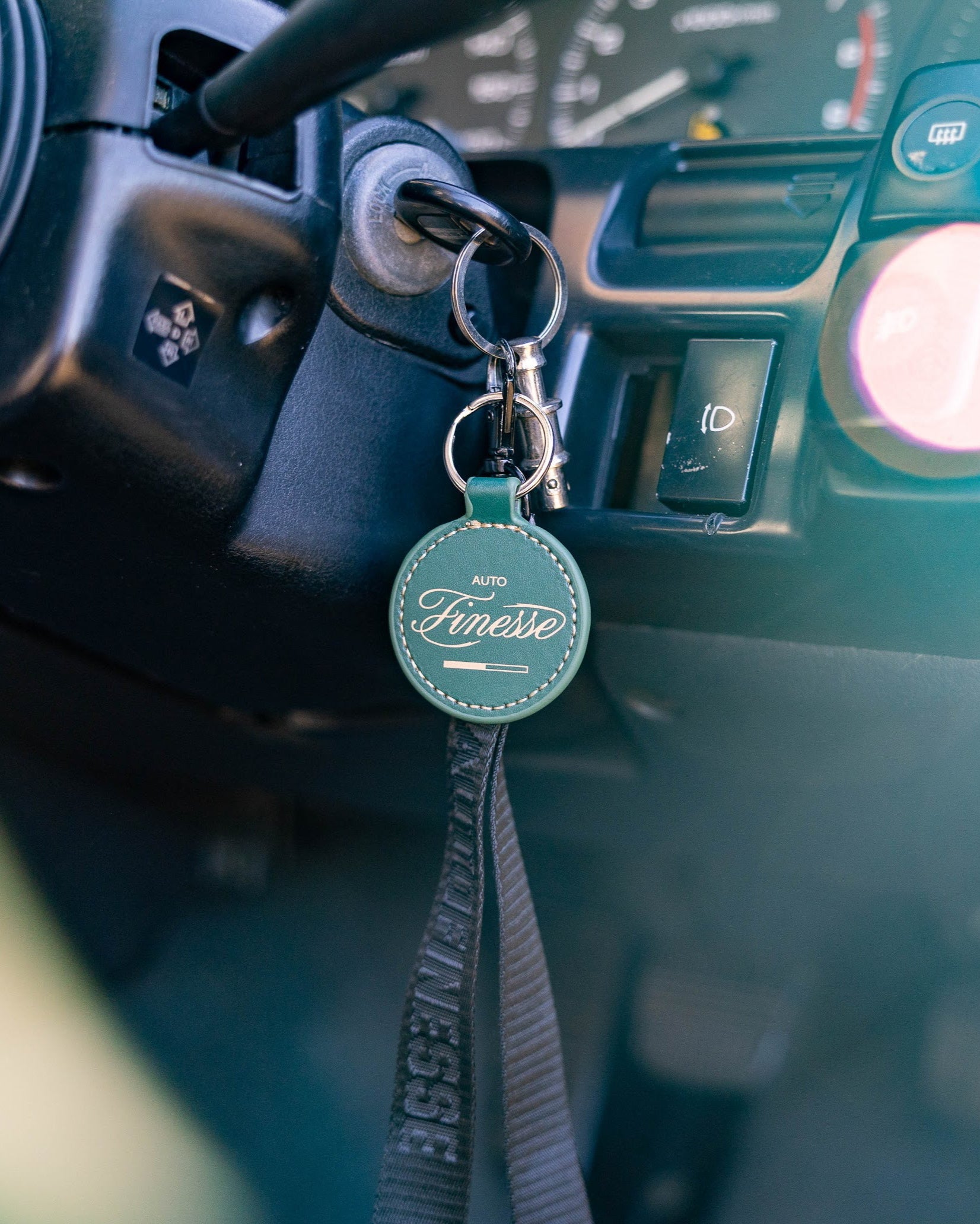 Drive & Vibe AW 23 Key Ring_ Hanging in car