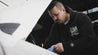 The Signature Logo Hoodie_Man Wearing